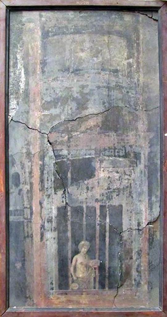 V. 30, Herculaneum. Room 2. Architectural scene with figure from west wall..
Now in Naples Archaeological Museum. Inventory number 8578.